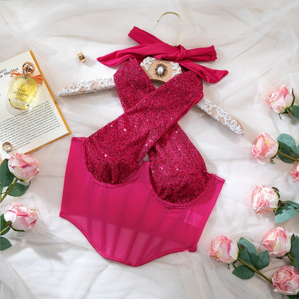 Luxurymania24 fuchsia sequin cups and sheer mesh bustier halter top on white cloth with roses