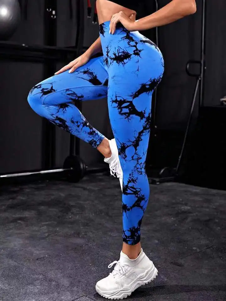Luxurymania24 seamless high waist gym leggings in blue and black tie-dye design worn during workout