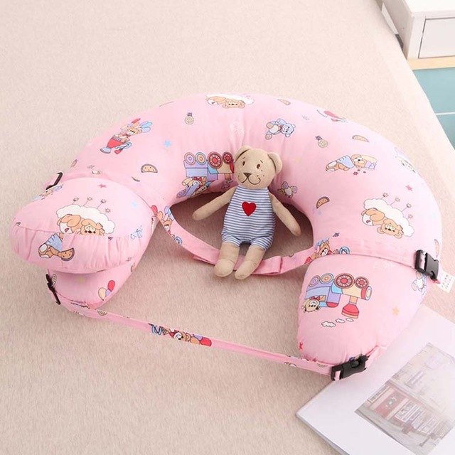 Pink cartoon print Multifunctional Nursing Pillow with adjustable strap and buckle and small teddy for breastfeeding support
