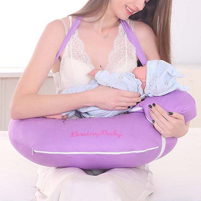 Multifunctional Nursing Pillow purple U shaped with shoulder strap and zip pocket supporting mother breastfeeding baby
