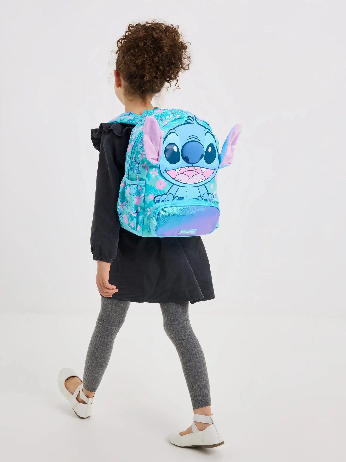 Smiggle school bag set for girls turquoise Stitch backpack with three dimensional ears worn by young girl from back