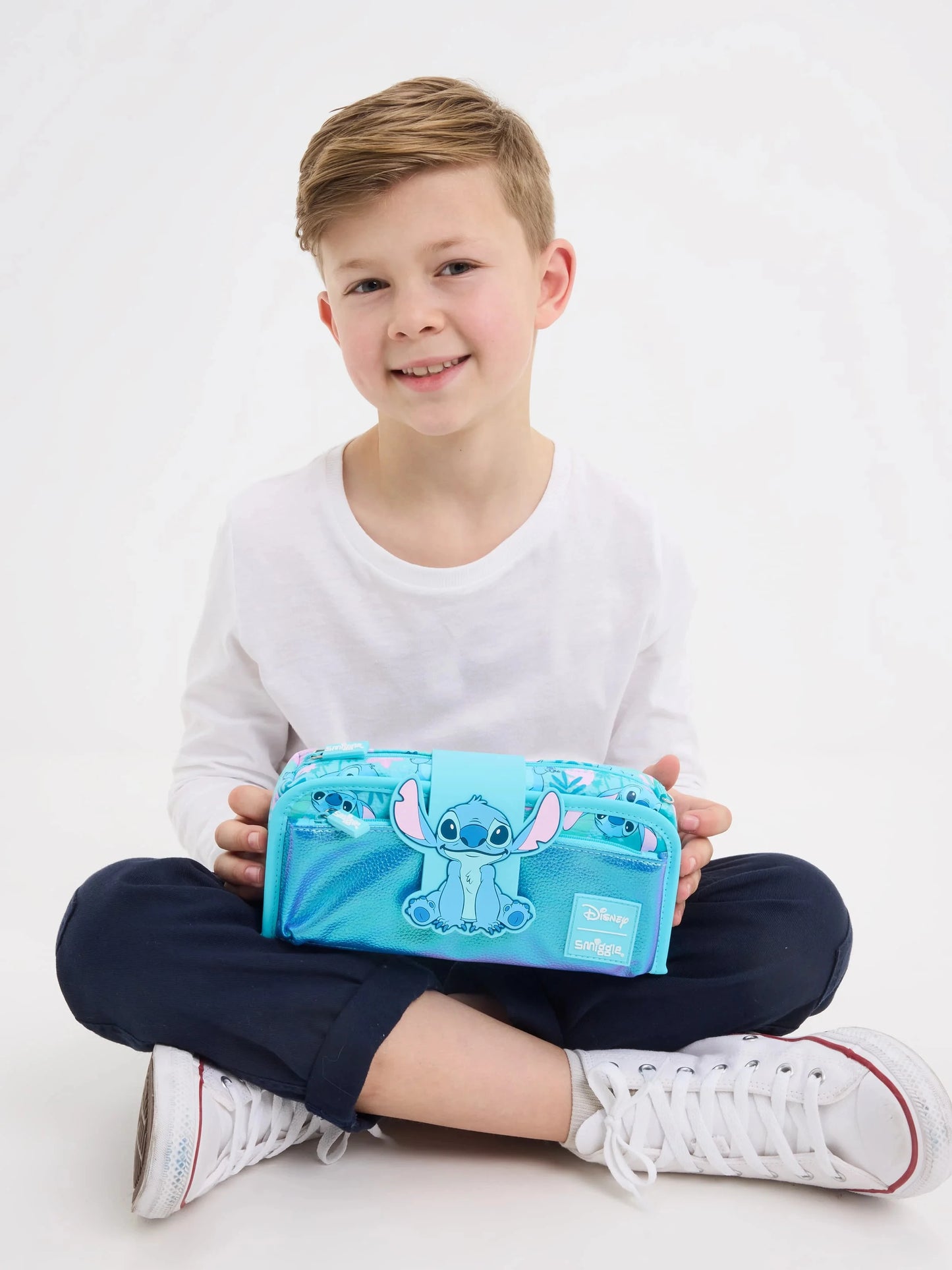 Smiggle school bag set for girls blue Stitch pencil case held by smiling child showing zip compartments ideal for school