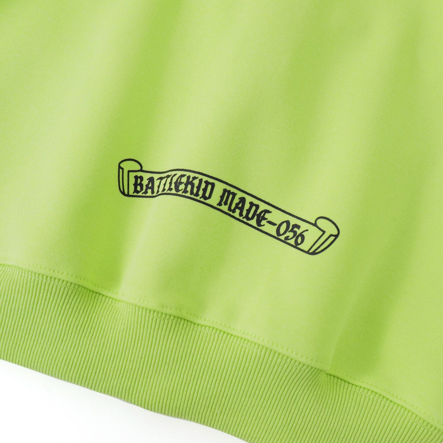 Lime green Street Style Cross Print Hoodie by eprolo with ribbed hem and small black scroll logo near hem