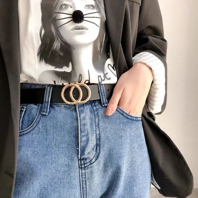 Luxurymania24 Ladies Carved Metal Buckle Leather Belt in black with gold double ring buckle worn with jeans and blazer