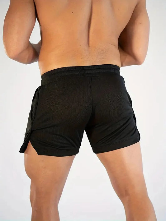 Black Luxurymania24 fitness running shorts for men shown from back on muscular model