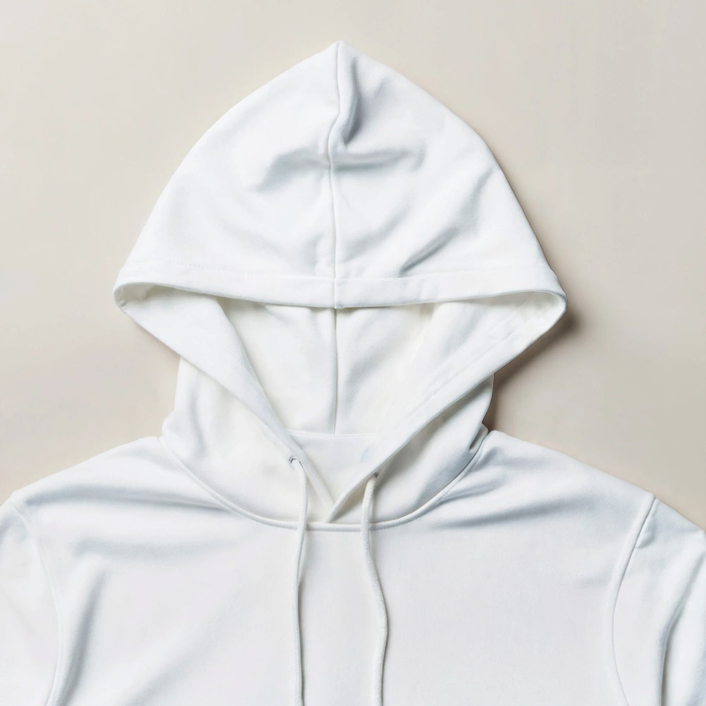 Unisex white pullover hoodie with drawstring hood and soft fabric by Luxurymania24