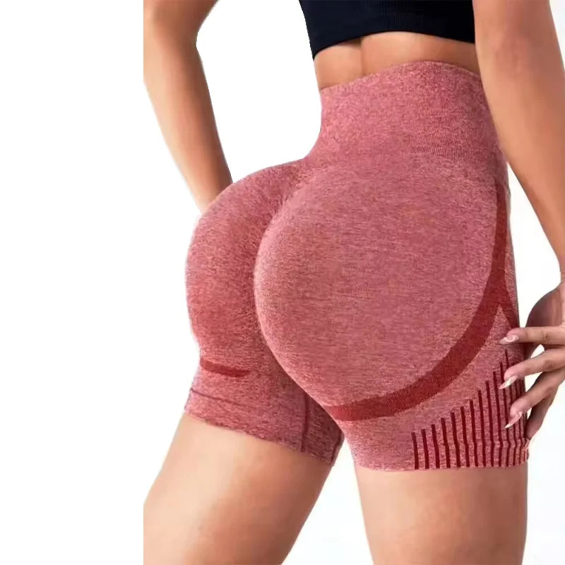 Pink seamless high-waisted Butt Lift Fitness Shorts enhancing curves and support for workouts