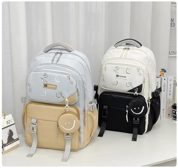 Two cute school backpacks in beige grey and white black with smiley pouch primary school backpack for girls