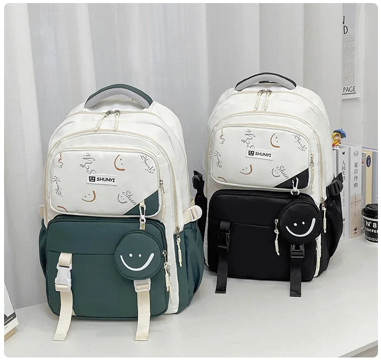 Luxurymania24 white patterned and green and black backpacks with front pocket and smiley pouch primary school backpack for girls