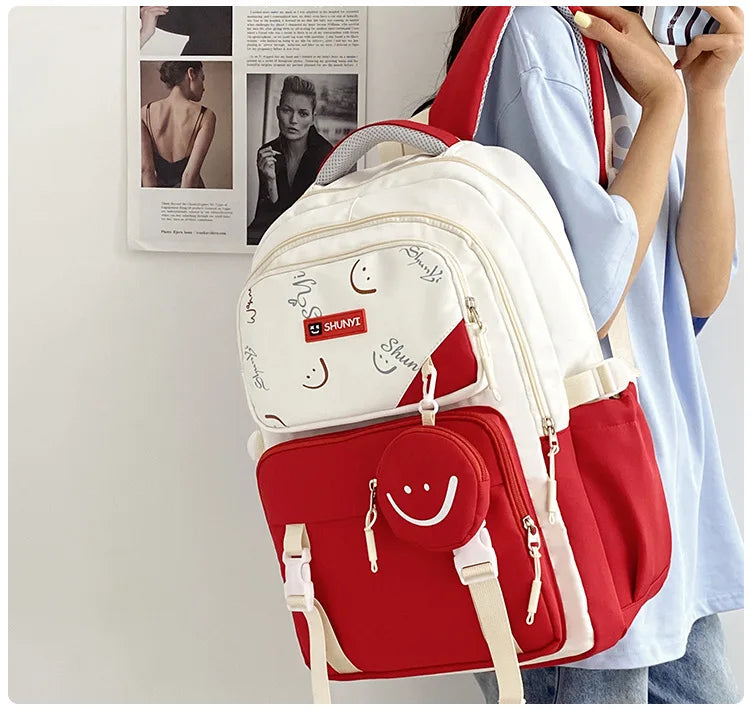 Red and white school backpack with smiley pouch multiple pockets padded straps primary school backpack for girls