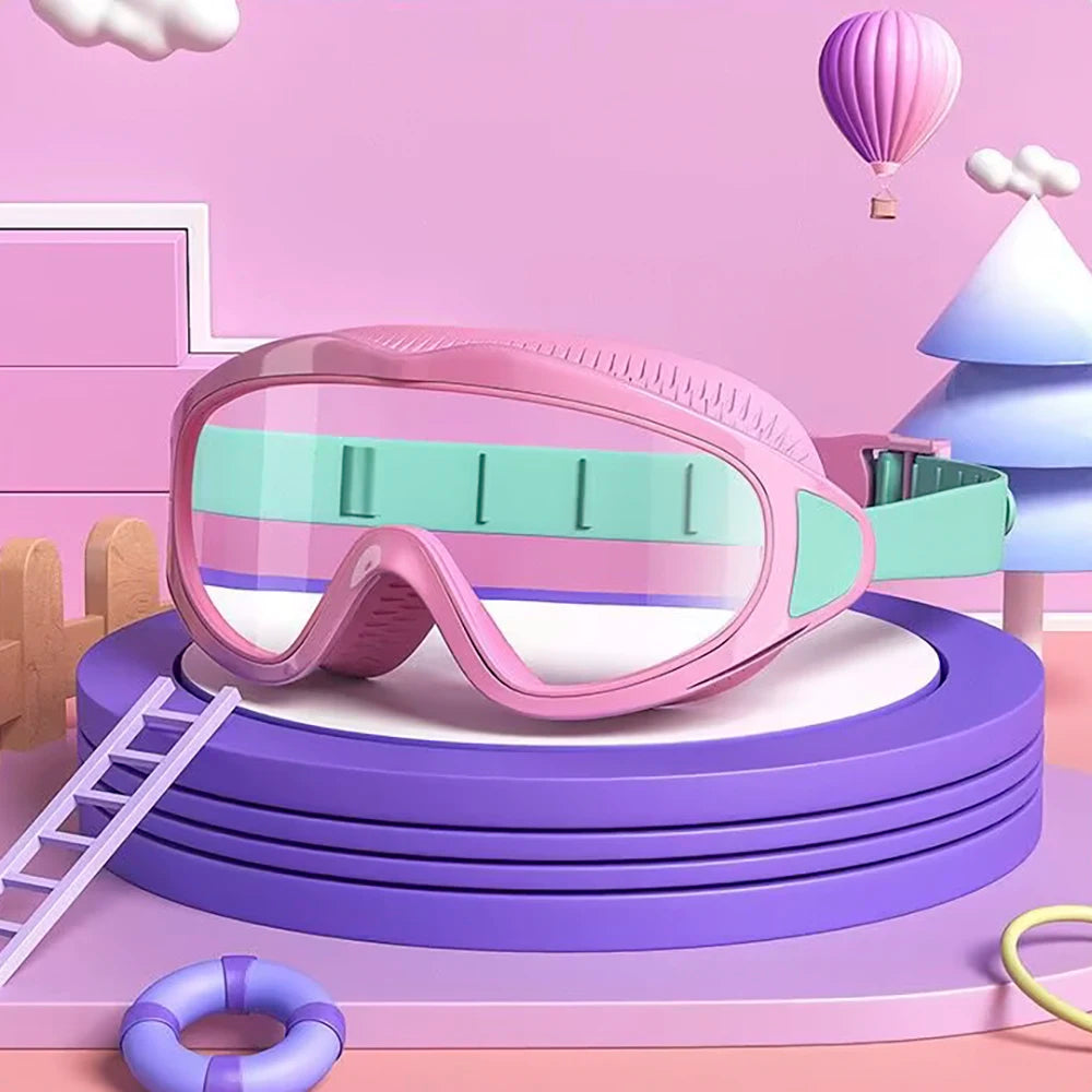 Pink and green UV protection kids pool goggles displayed on a purple platform with playful background