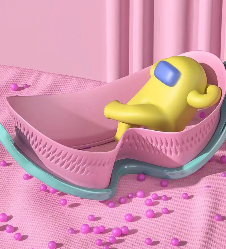 UV protection kids pool goggles displayed with a yellow and pink toy in a playful setting