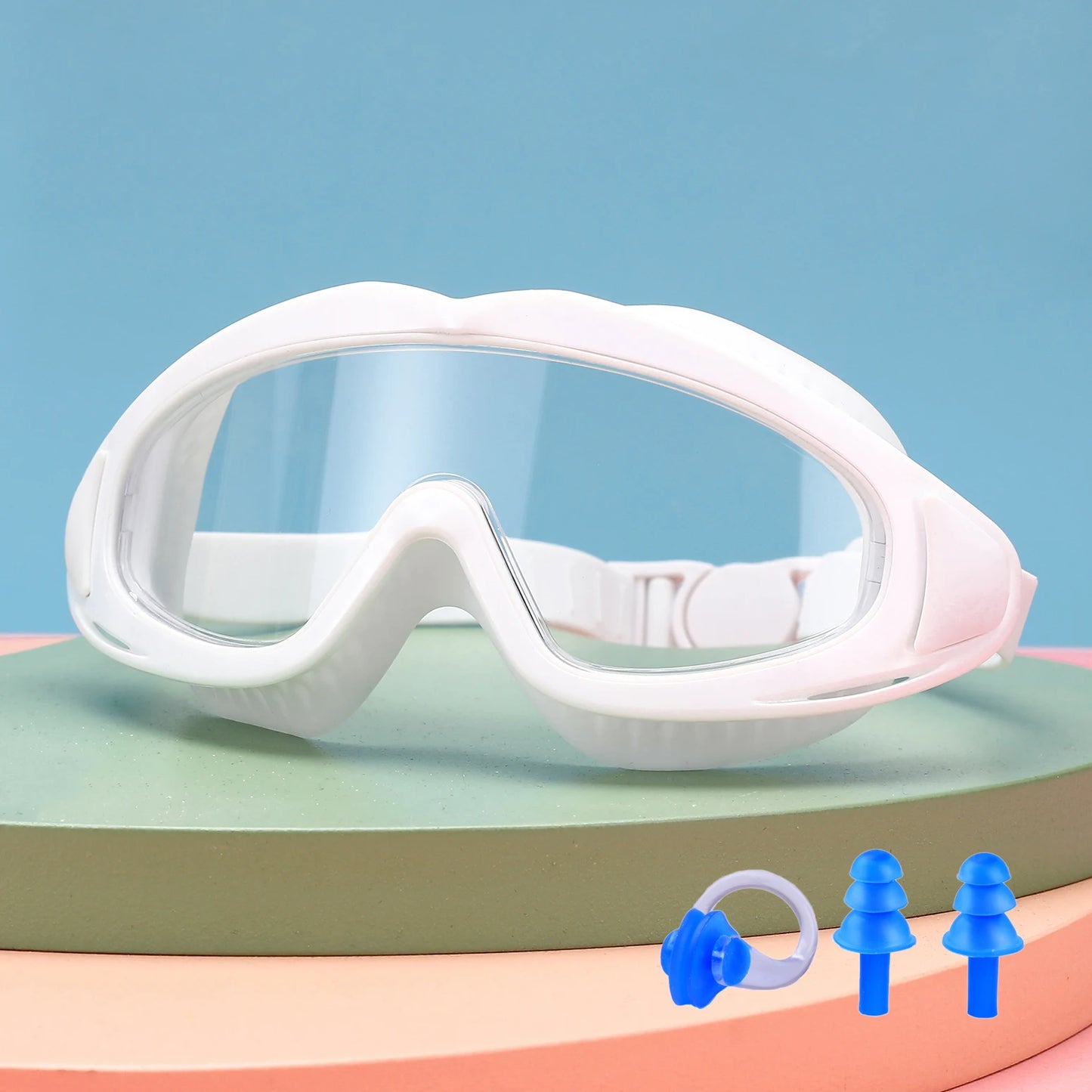 White UV protection kids pool goggles with clear lenses and blue earplugs and nose clip