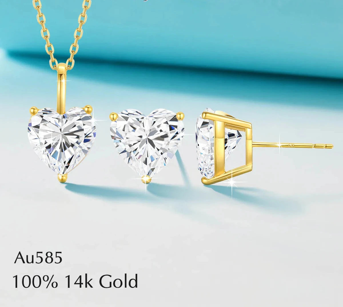Heart-shaped crystal jewelry set with gold necklaces and earrings on a light blue background.