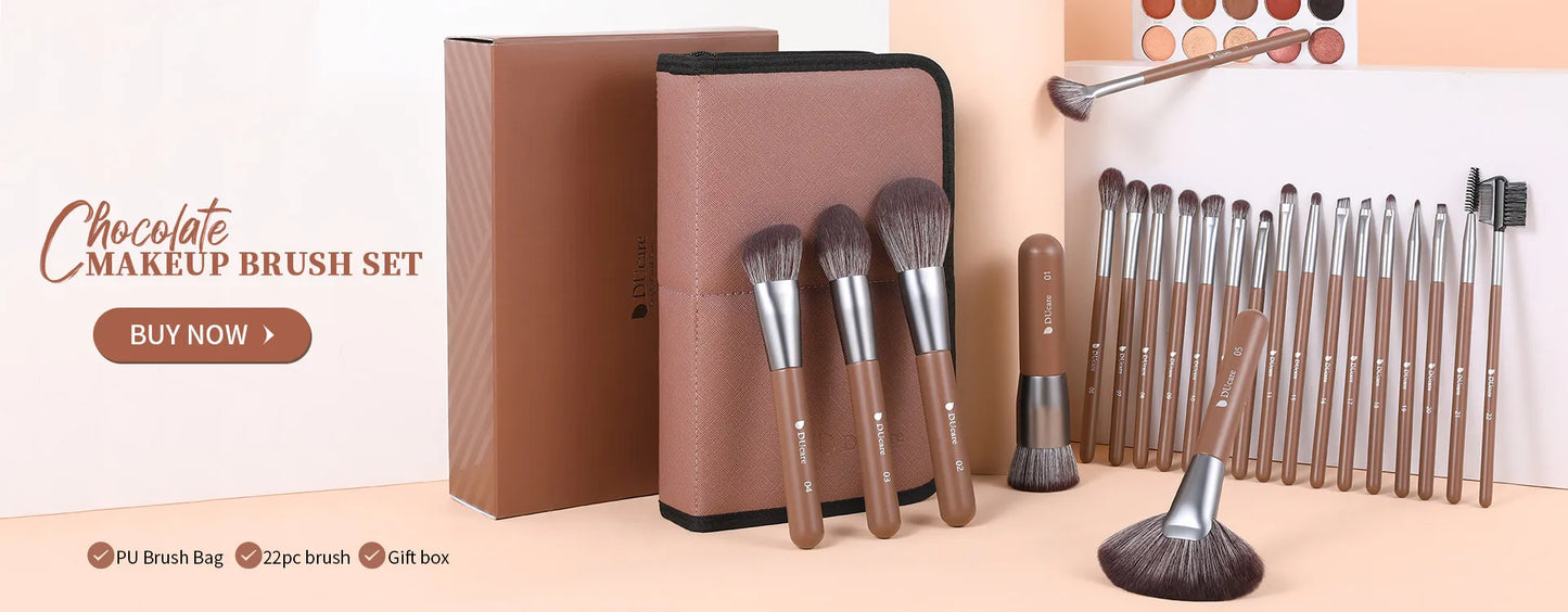 Makeup brush set with brown handles and silver ferrules, including a gift box and additional brushes on a beige background.
