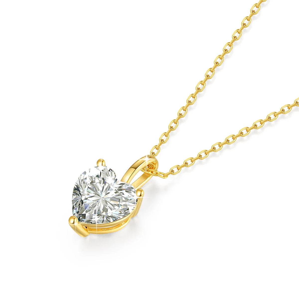 Gold necklace with a heart-shaped diamond pendant on a white background