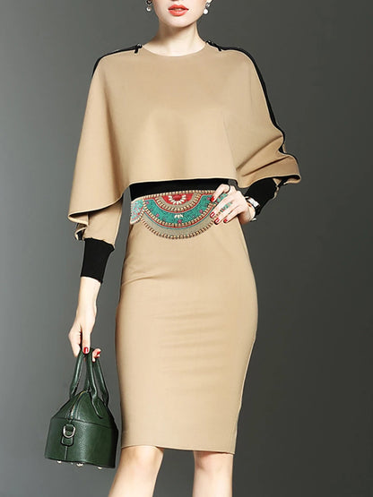 Beige fitted midi dress with cape sleeves featuring a boho flower waist belt for women, styled with green leather handbag