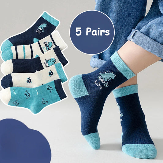 Five pairs of boys cotton crew socks in navy blue and light blue with playful designs