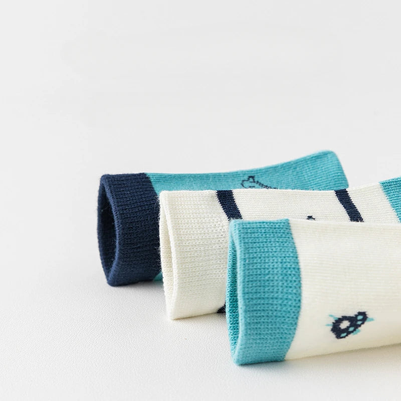 Pack of boys cotton crew socks with fun designs in blue and white for everyday wear