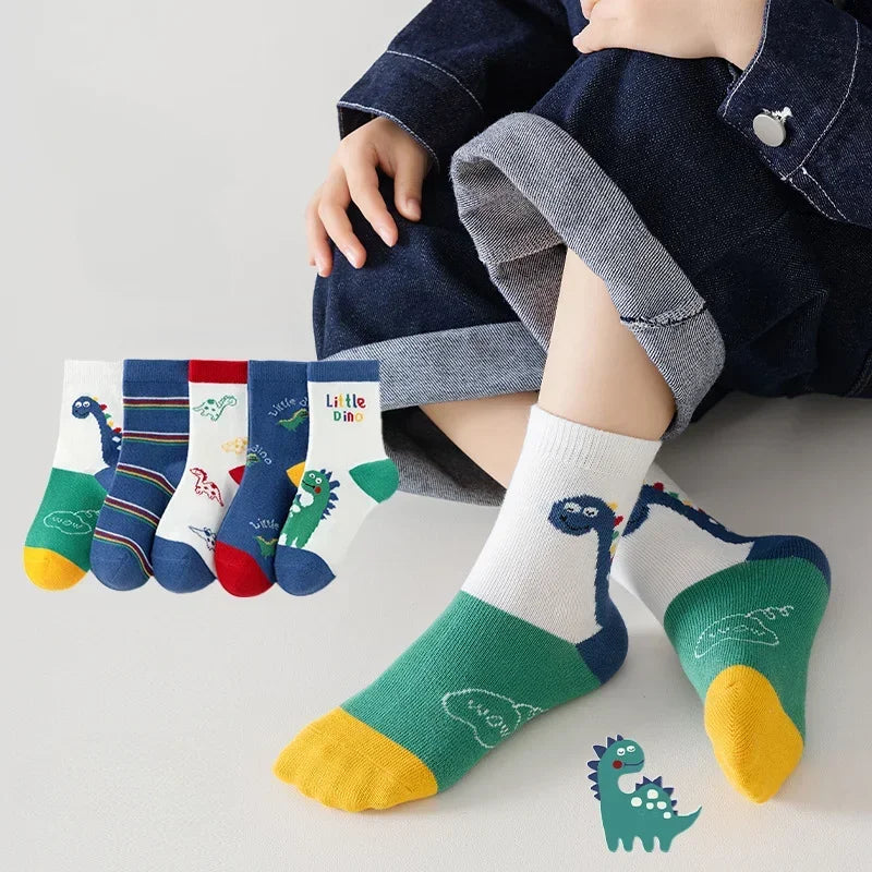 Set of boys cotton crew socks featuring colourful dinosaur designs and various patterns