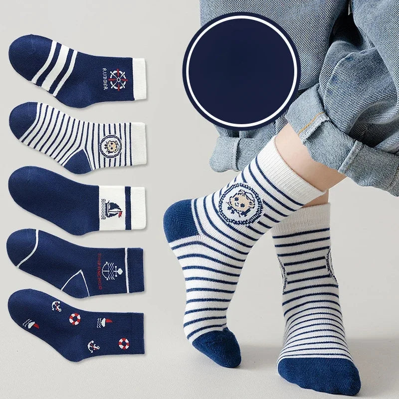 Pack of boys cotton crew socks in various nautical designs and navy stripes for everyday comfort