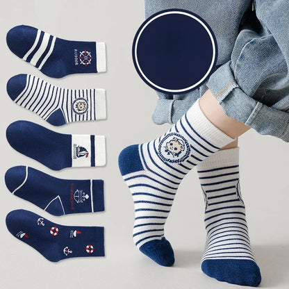 Pack of boys cotton crew socks in various nautical designs and navy stripes for everyday comfort