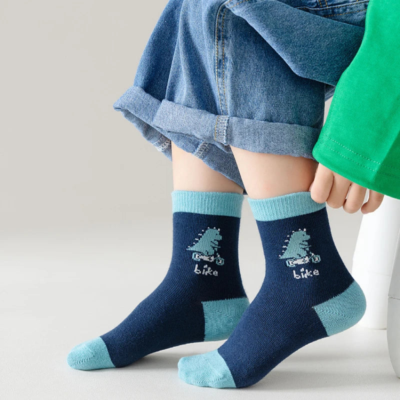 Boys cotton crew socks in blue and green with fun bike print for comfort and style
