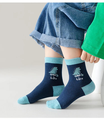 Boys cotton crew socks featuring a fun bike design in navy and teal colours