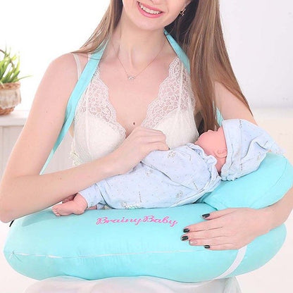 Young mother using light blue Multifunctional Nursing Pillow to comfortably breastfeed newborn baby while seated