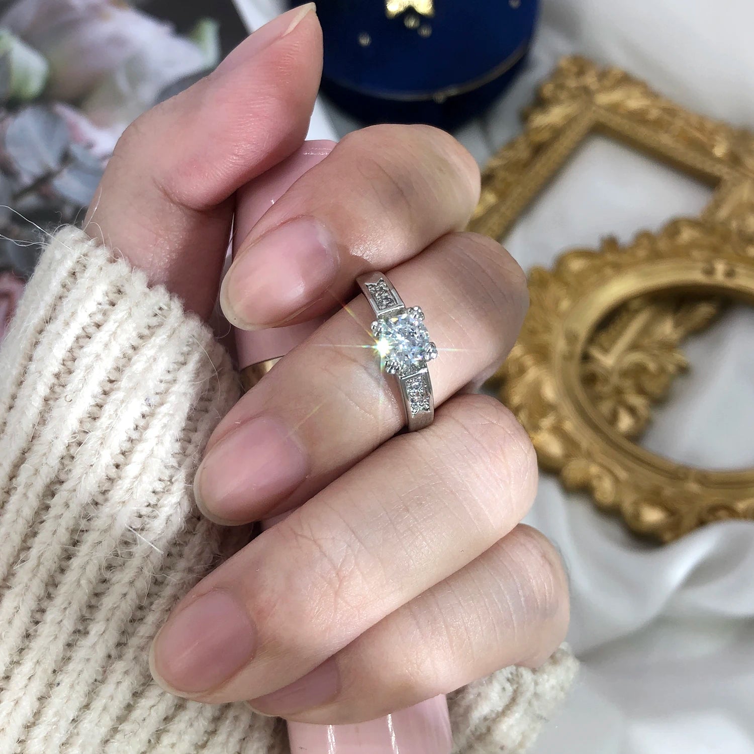 Elegant cubic zirconia wedding ring for women showcased on a hand with soft lighting