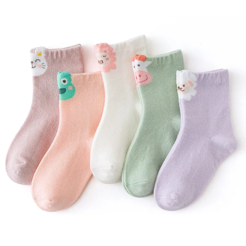 Five pairs of cute kids warm socks for winter in pastel colours with animal designs