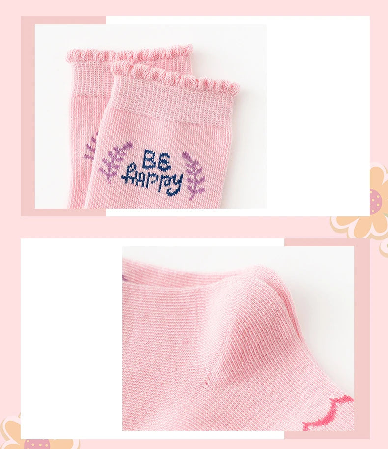 Cute kids warm socks for winter in pink with a cheerful message and frill details