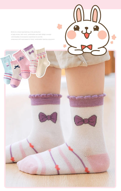 Adorable cute kids warm socks for winter with bow design, perfect for keeping little feet cosy