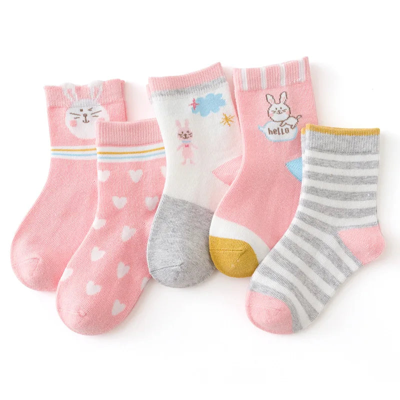 Set of five cute kids warm socks for winter featuring playful designs and bright colours