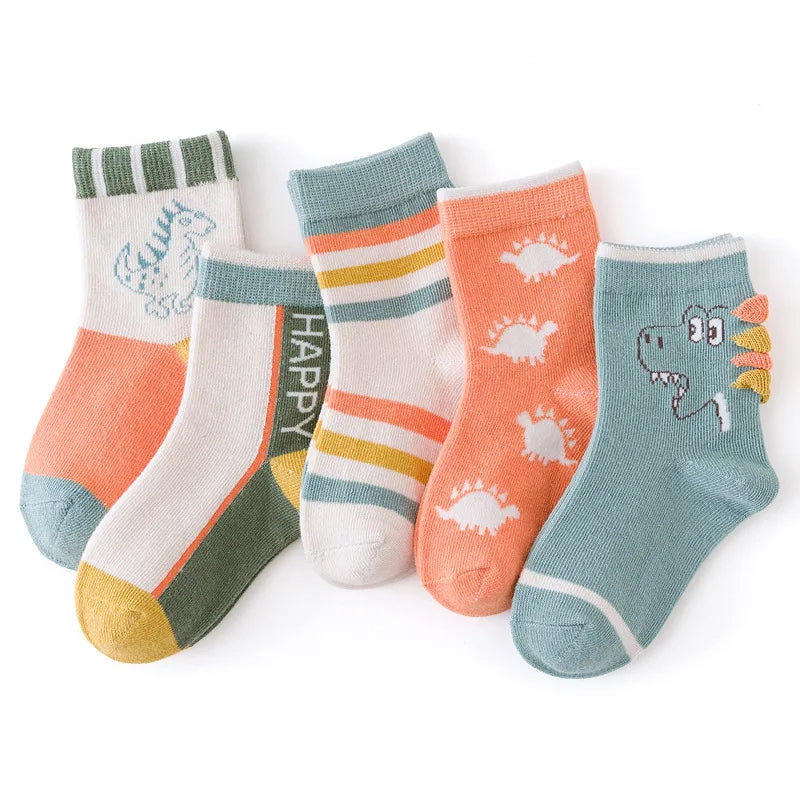 Set of five cute kids warm socks for winter featuring fun dinosaur designs and vibrant colours
