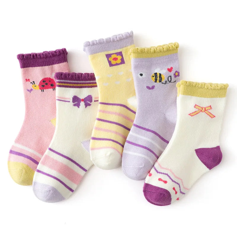 Set of five cute kids warm socks for winter in various colours and playful designs