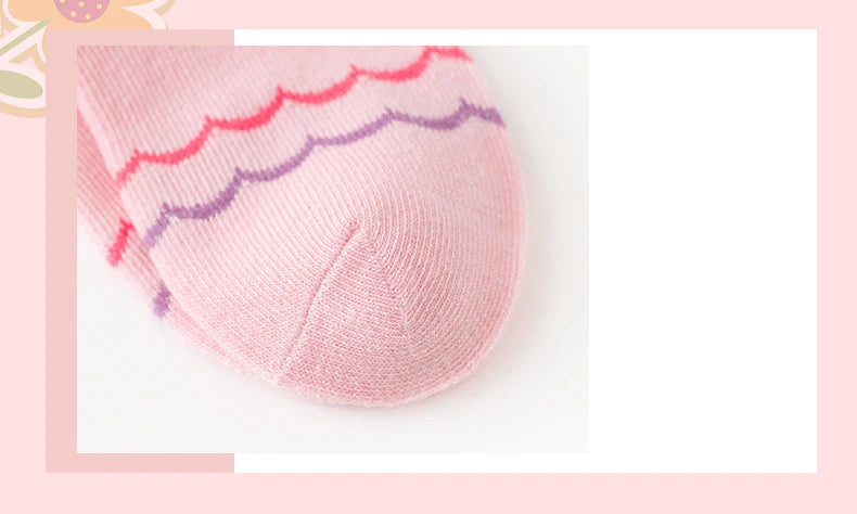Soft pink cute kids warm socks for winter with colourful wave pattern for added fun and warmth