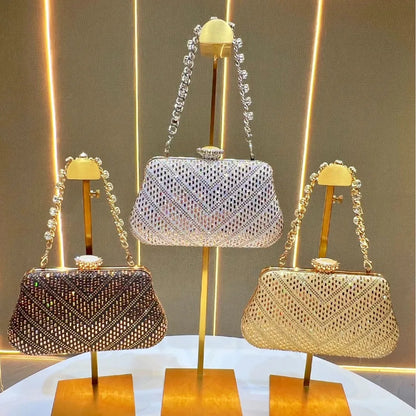 Three designer handheld shoulder bags UK in gold and silver with sparkling embellishments