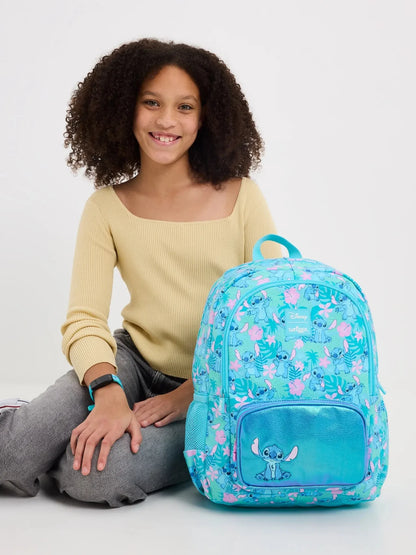 Smiggle school bag set for girls turquoise floral backpack with Disney Stitch front pocket shown with smiling girl