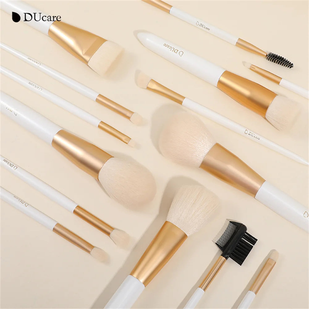Collection of DUcare highlighter brush and makeup accessories in elegant gold and white design
