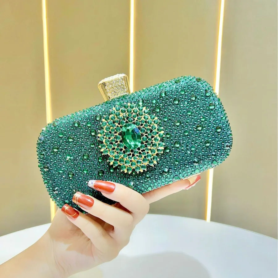 Emerald rhinestone party handbag embellished with sparkly stones and a decorative centrepiece