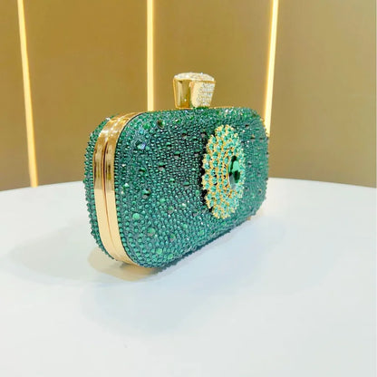 Emerald rhinestone party handbag with intricate detailing and gold clasp for elegant occasions