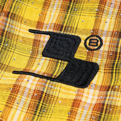 Street Style Diamond Embroidery Shirt close up of yellow plaid fabric with black embroidered logo and crystal studs