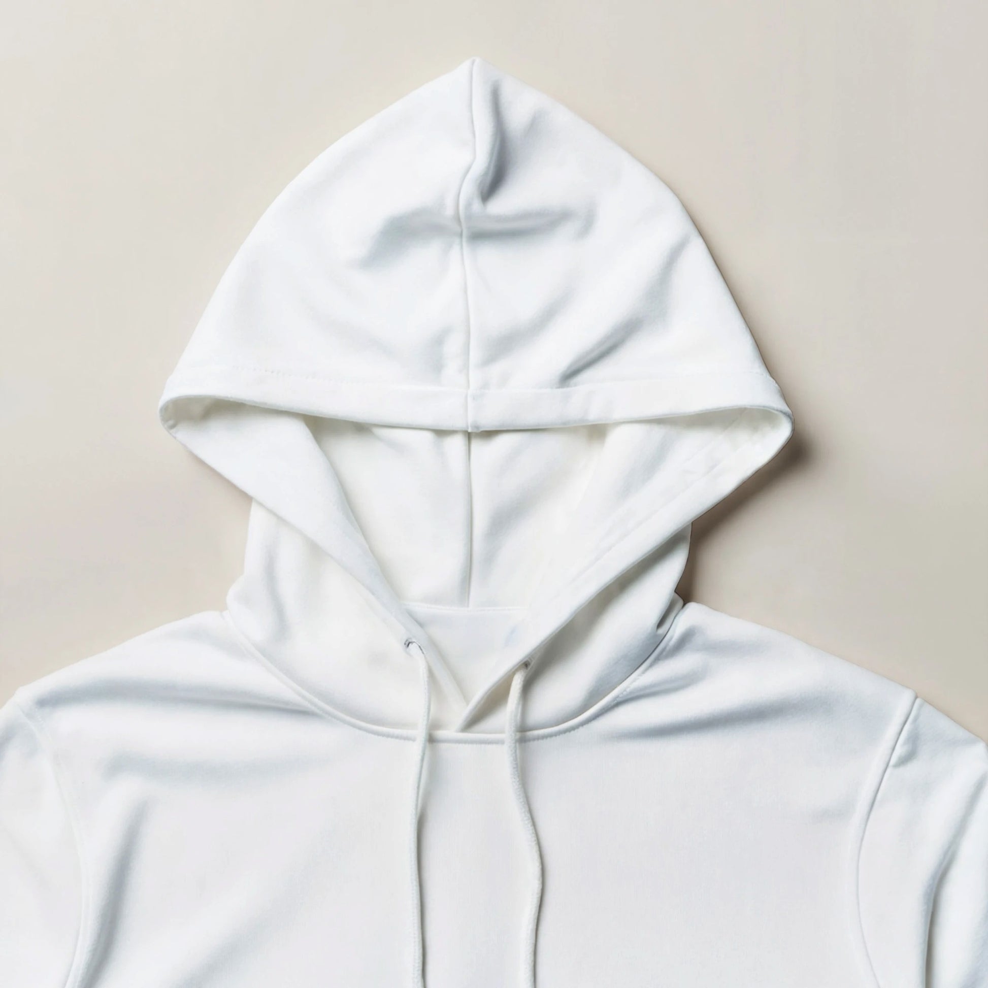 Unisex white pullover hoodie with drawstring hood and soft fabric by Luxurymania24