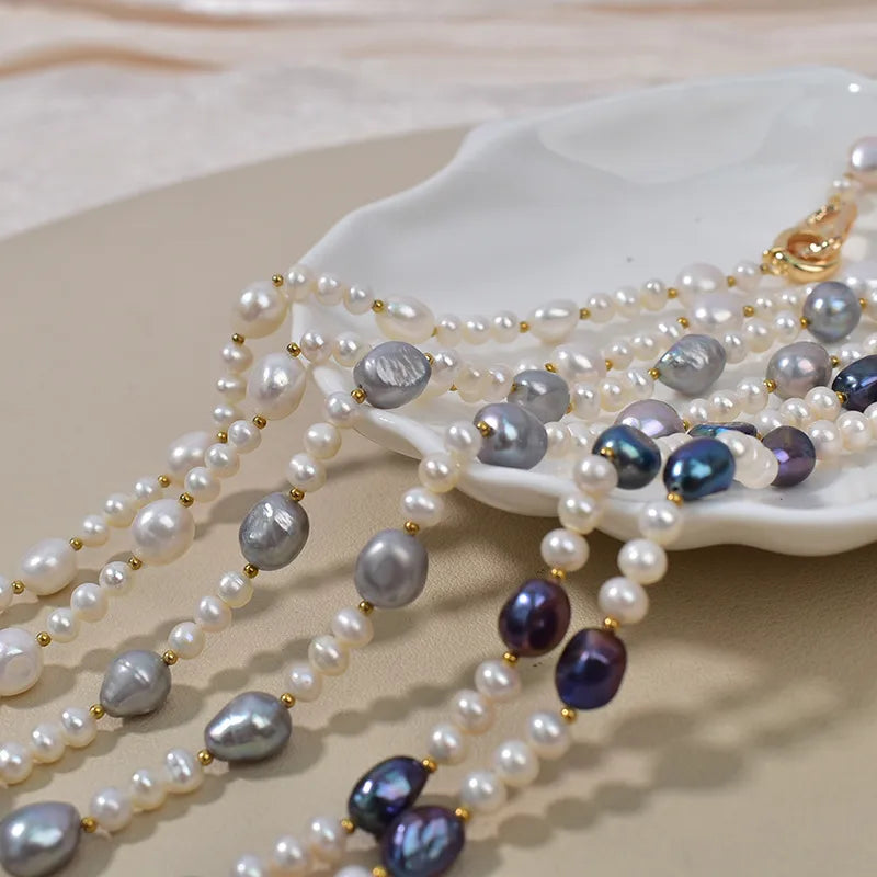 Handmade freshwater pearl necklace for women displayed elegantly on a white dish.