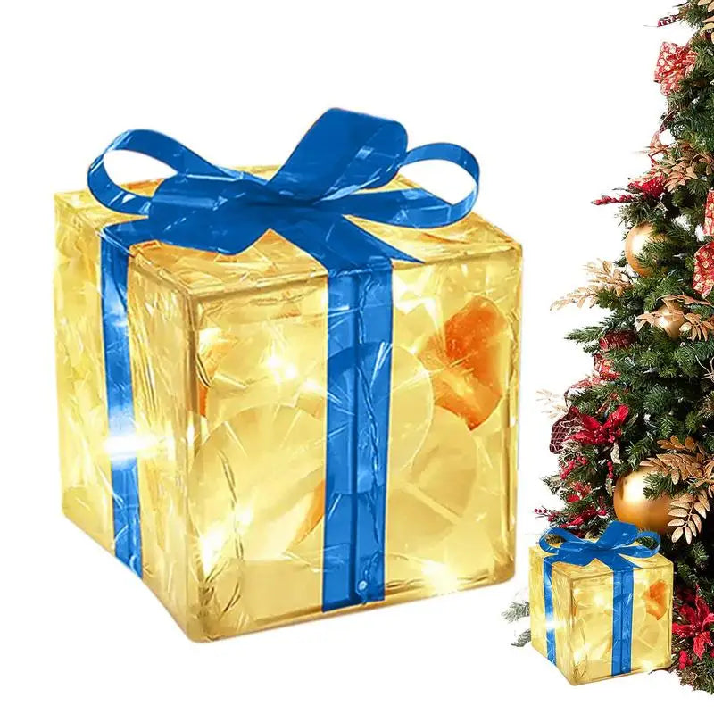 LED Christmas box ornaments with a shiny gold finish and blue ribbon, perfect for festive decorations