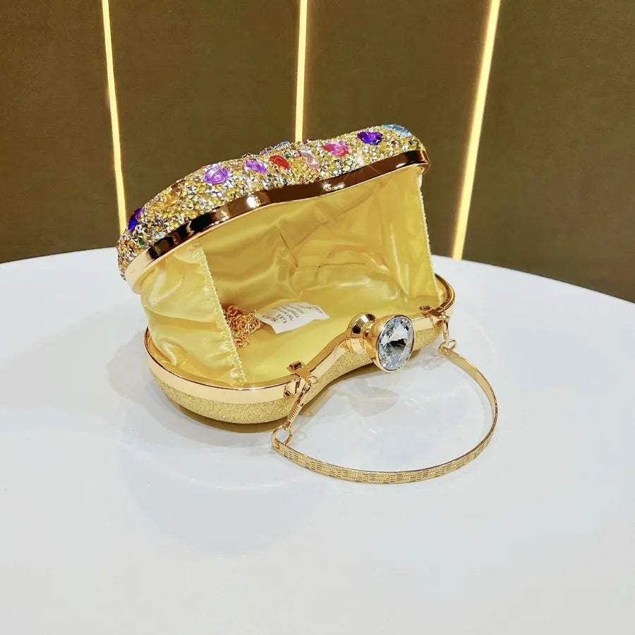 Lightweight embellished shoulder bag women with a golden interior and decorative stones inside