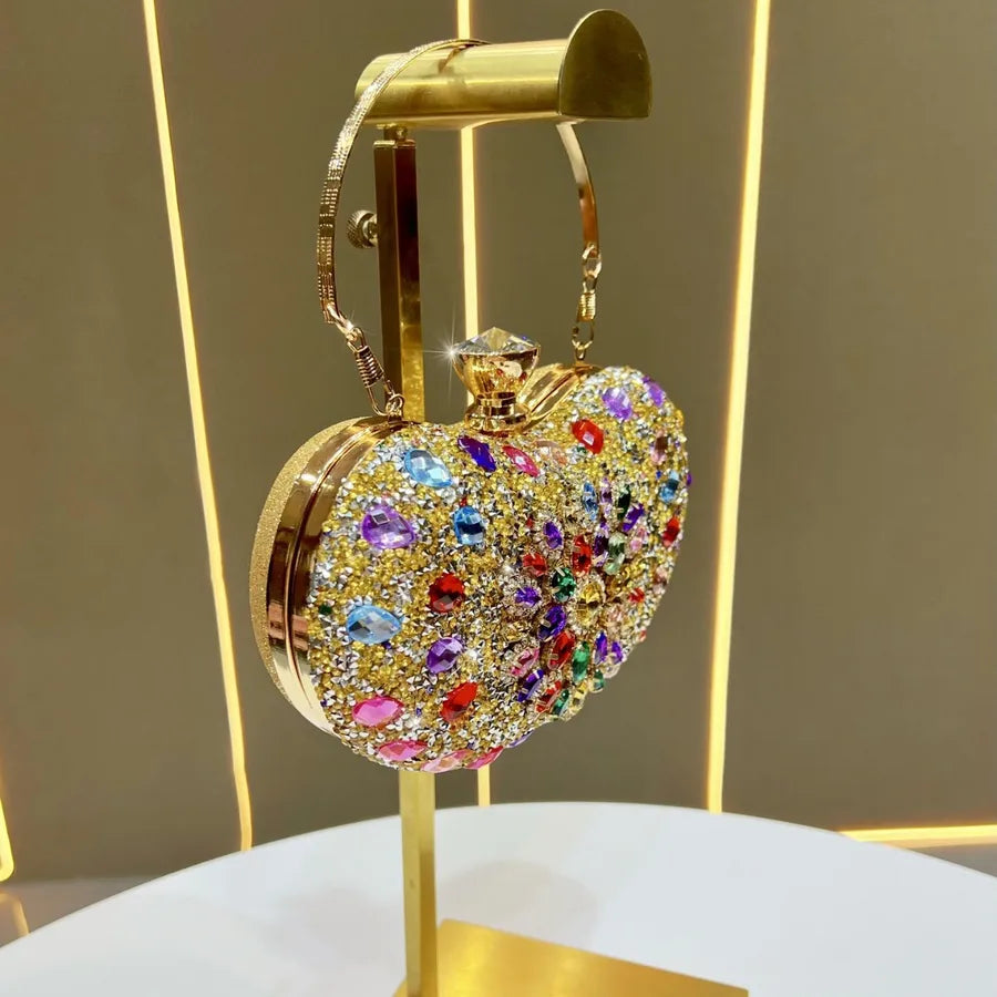 Lightweight embellished shoulder bag women with vibrant gems on a gold background for elegant occasions