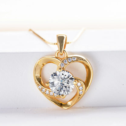 Luxurymania24 Moissanite heart pendant necklace in gold with sparkling centre stone and design details