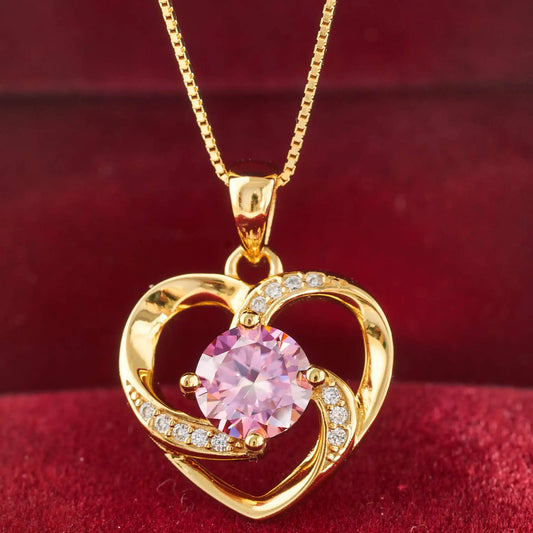 Luxurymania24 Moissanite heart pendant necklace in gold with sparkling details and a pink centre gem